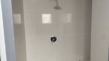 Shower, towels, soap, shampoo