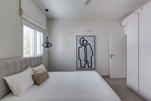 Blackout curtains, iron/ironing board, free WiFi, bed sheets