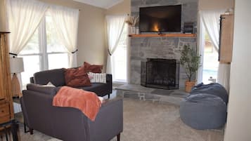 Smart TV, fireplace, books