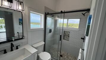 Shower, hair dryer, towels, soap