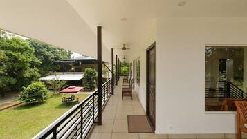 Deluxe Room, Garden View | Terrace/patio
