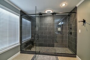 Bathtub, jetted tub, hair dryer, towels