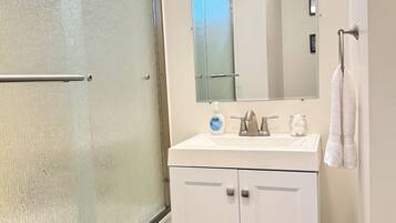 Hair dryer, towels, soap, shampoo