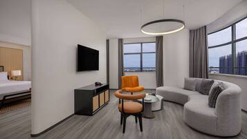 Minibar, coffres-forts dans les chambres, fer et planche à repasser