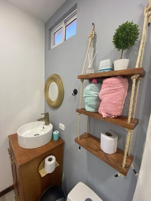 Shower, towels, soap, shampoo