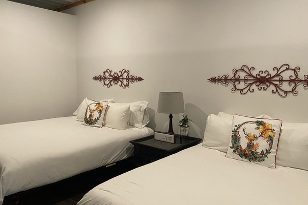 Main bedroom with 1 king bed and 1 double bed