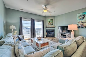 TV, fireplace, DVD player, books - Balcony w/ Inlet View: Dtwn Ocean City Condo (Ocean City)