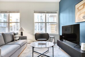 TV, stereo - Trendy Cambridge Alewife 2BR w/ W/D, Gym & Roof, nr T, by Blueground (Cambridge)