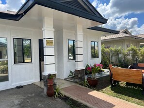 A white building with a sign indicating 'Corso Residence BLK 35 - Lot 7'. - 2bed Transient House Villa in Davao City Free Wifi (Davao)