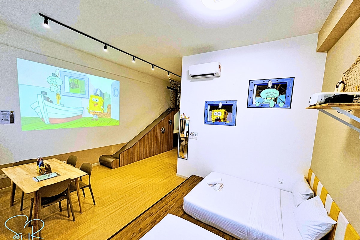 SpongeBob Theme Loft Apartment | Living area | 90-inch Smart TV with digital channels, TV, Netflix
