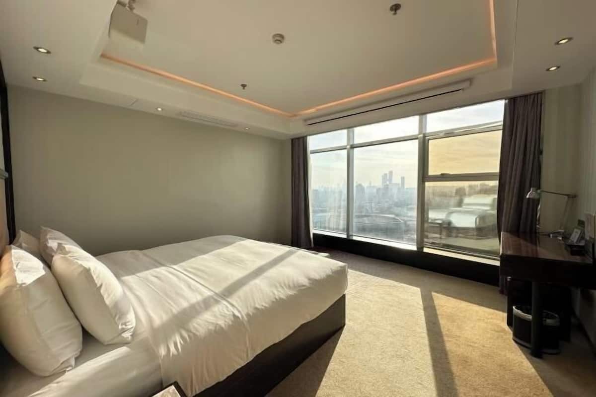 1 chambre, lit de bébé (gratuit), accès au Wi-Fi (inclus)