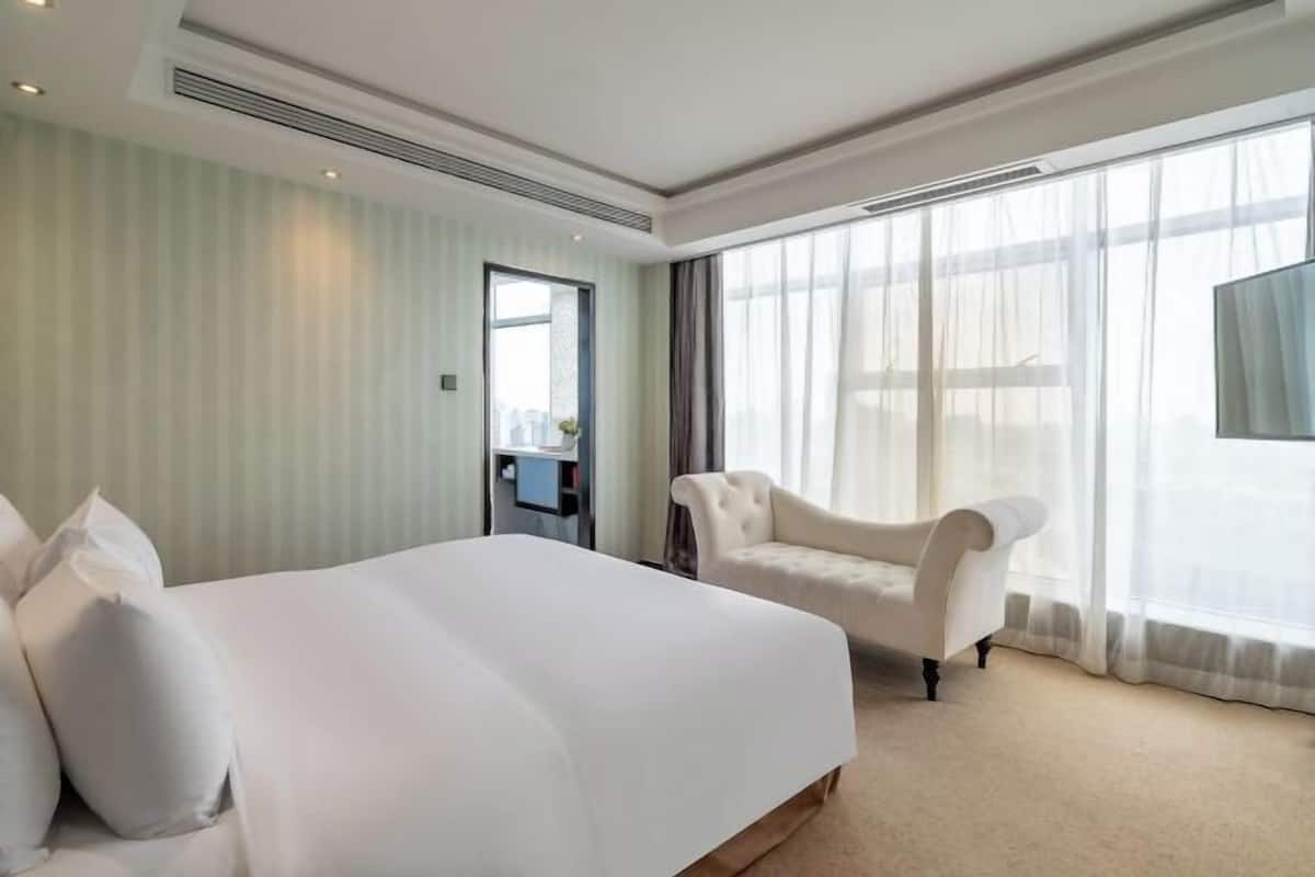 1 chambre, lit de bébé (gratuit), accès au Wi-Fi (inclus)