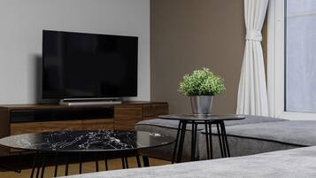 Family Villa | Living area | Flat-screen TV