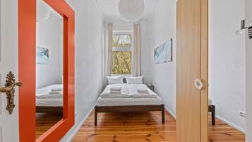 2 habitaciones, tabla de planchar con plancha, wifi y ropa de cama