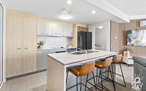 Fridge, microwave, oven, stovetop - Wings – 3 Bedroom Apartment, low floor (Surfers Paradise)