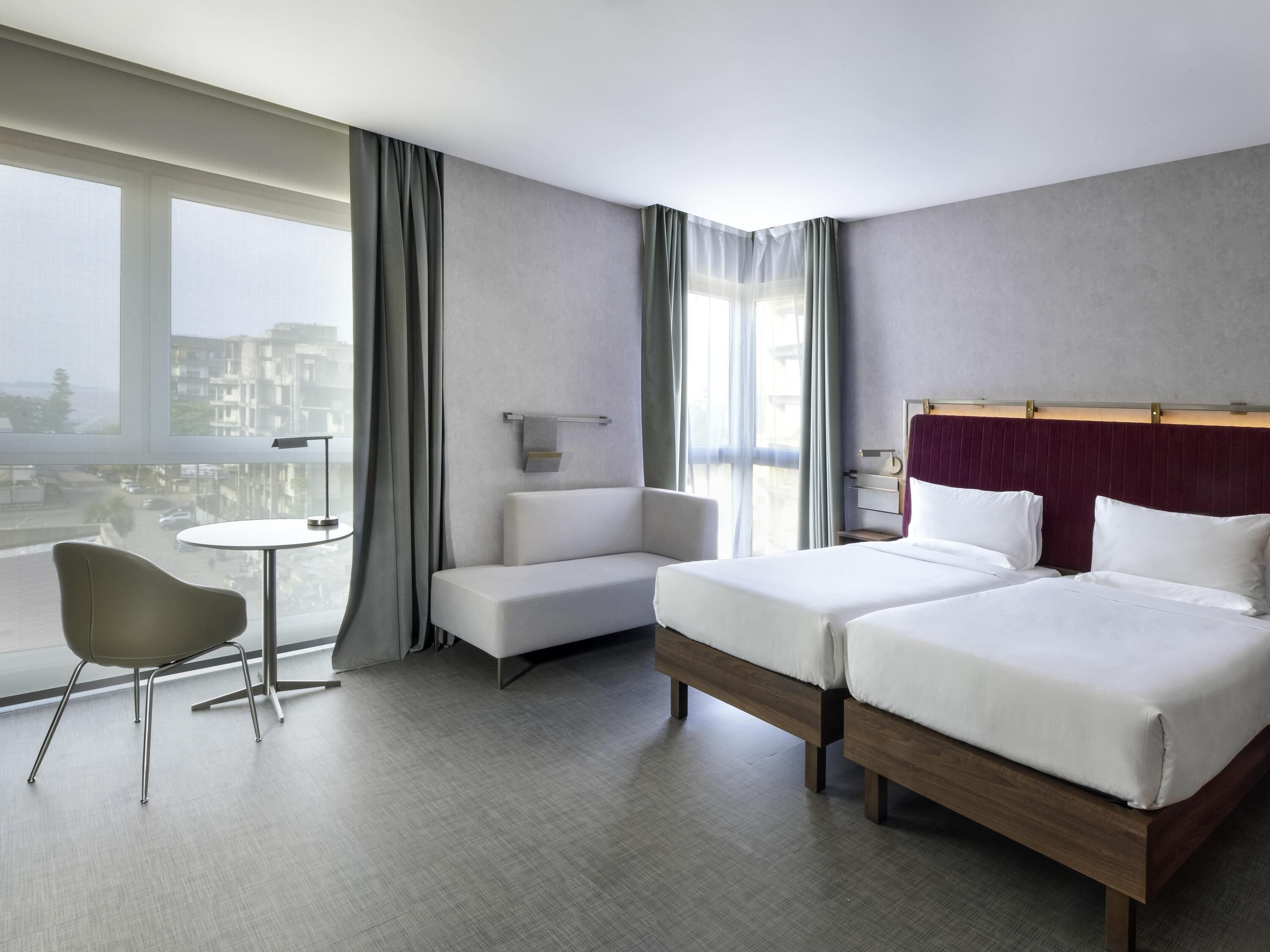 Standard Room, 2 Twin Beds | Minibar, in-room safe, individually decorated, laptop workspace