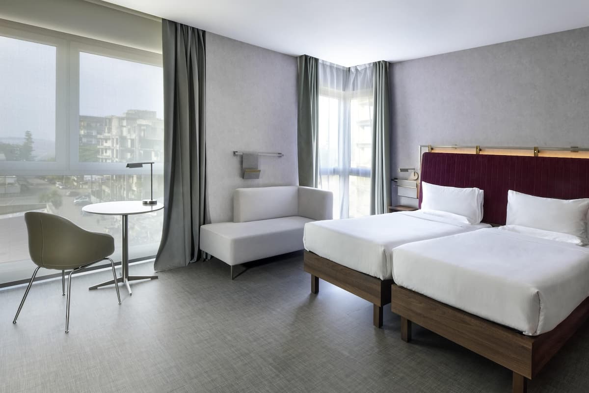 Standard Room, 2 Twin Beds | Minibar, in-room safe, individually decorated, laptop workspace