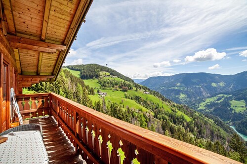Appartement "Ferienwohnung Bergblick" avec vue sur le lac, terrasse privée et jardin privé.