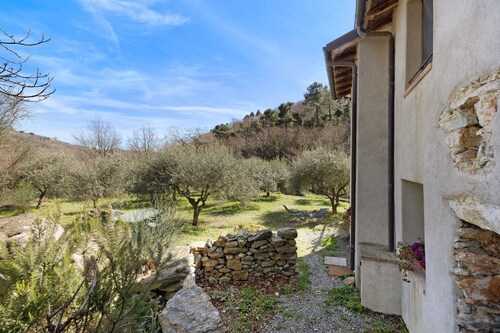 Ferienhaus 'Del Fiume' mit Bergblick und Privatem Garten