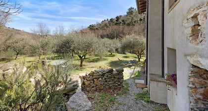 Ferienhaus 'Del Fiume' mit Bergblick und Privatem Garten
