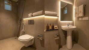 Dusj, regndusjhode, håndklær og såpe