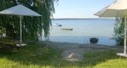 Seagull house, beach, bathing jetty, boat mooring on Lake Plau