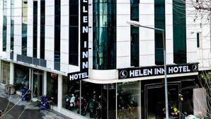 A modern building with a sign for 'Helen Inn Hotel'. - Helen Inn  (Izmir)