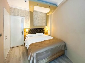 Deluxe Triple Room | Egyptian cotton sheets, premium bedding, Select Comfort beds