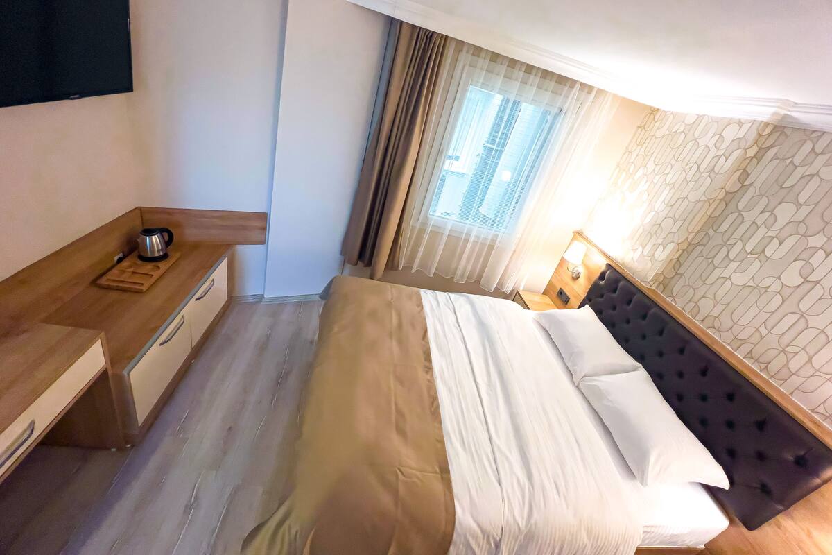 经济客房 | 埃及棉床单、高档床上用品、Select Comfort 床、笔记本电脑工作区