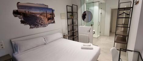 Minibar, wifi gratis y ropa de cama