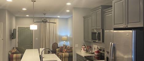 Fridge, oven, stovetop, cookware/dishes/utensils