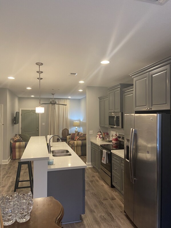 Fridge, oven, stovetop, cookware/dishes/utensils