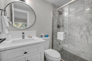 Bathtub, hair dryer, towels