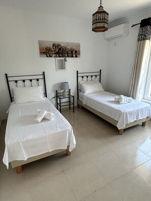 4 bedrooms, iron/ironing board, travel cot, WiFi