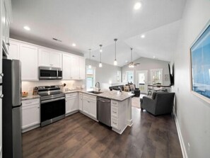 Villa, 3 Bedrooms | Private kitchen | Fridge, oven, coffee/tea maker, toaster - Red Snapper 3 Bedroom Villa by RedAwning (Carolina Beach)