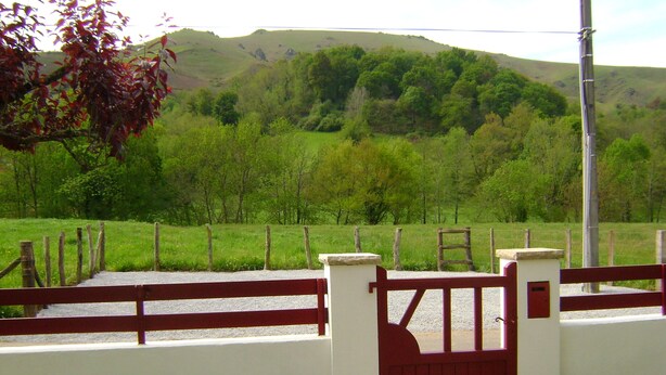 A gated entrance with a stone pathway leading to a grassy area. - GITE RURAL 4 PERS. NEAR ST JEAN PIED DE PORT (Ahaxe-Alciette-Bascassan)