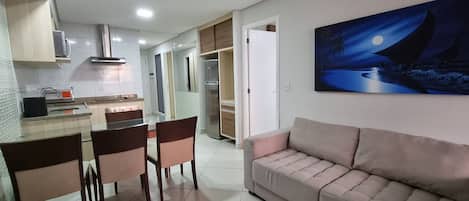 Comfort Apartment | Living area | 32-inch TV with satellite channels