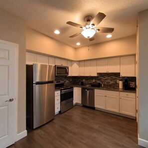 Fridge, microwave, oven, stovetop - Suites on Mass - 911 Massachusetts suite C2 (Lawrence)