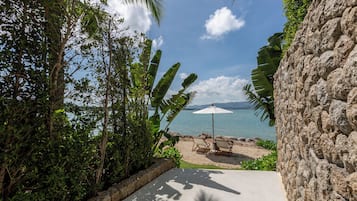 Private beach, white sand, sun-loungers, beach umbrellas