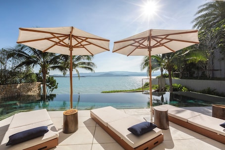 4 piscinas al aire libre, camas de piscina gratis, sombrillas