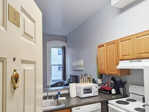 Fridge, microwave, oven, stovetop - Tanner Bldg Apt 5 - Studio (Downtown) (Bay City)