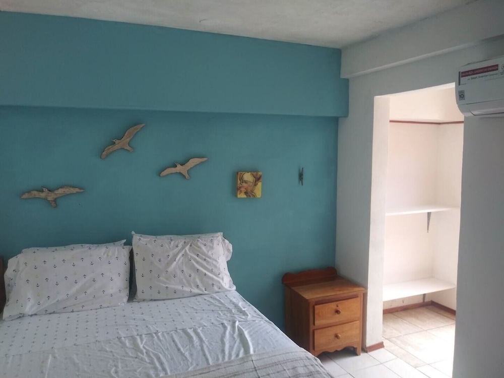 True beachfront apartment at ground level Caye Caulker Vrbo