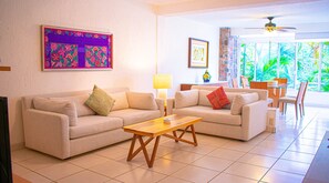 Deluxe Condo | Living area | LCD TV