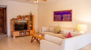 Deluxe Condo | Living area | LCD TV