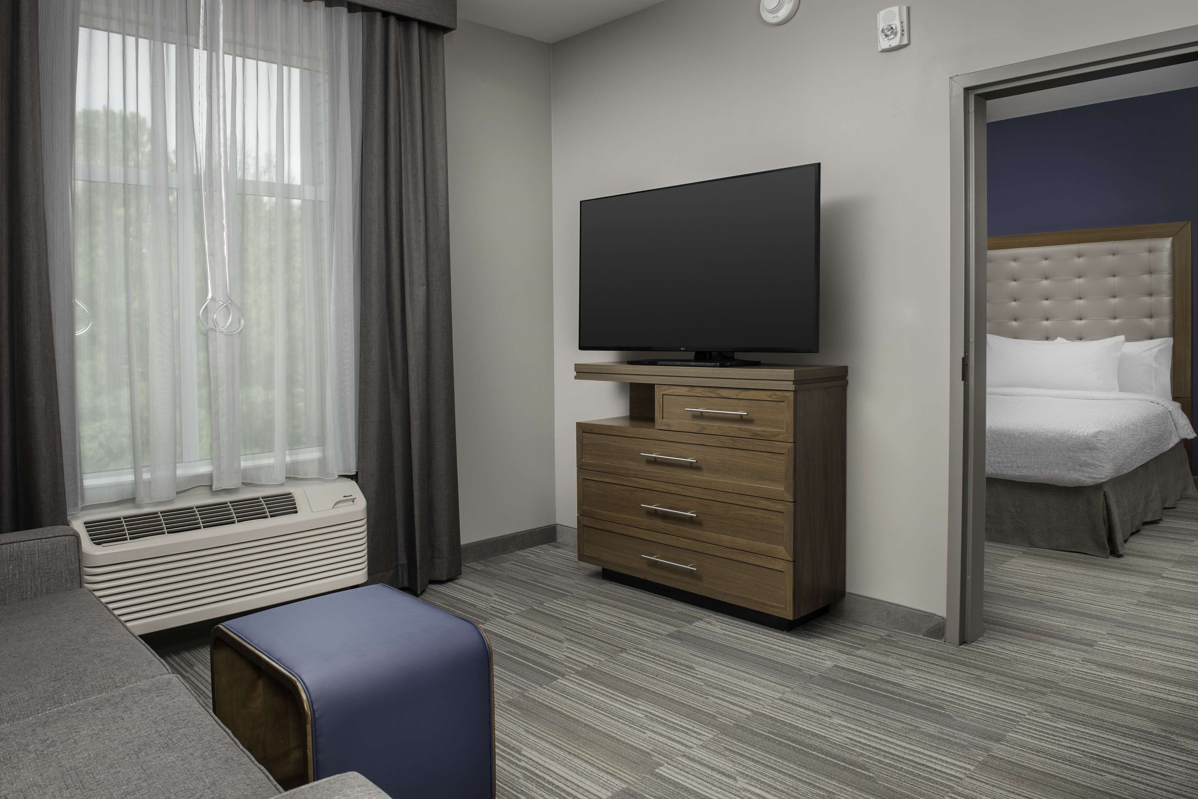 Suite, 2 Queen Beds, Accessible, Bathtub | Living area | 42-inch Smart TV with cable channels, TV