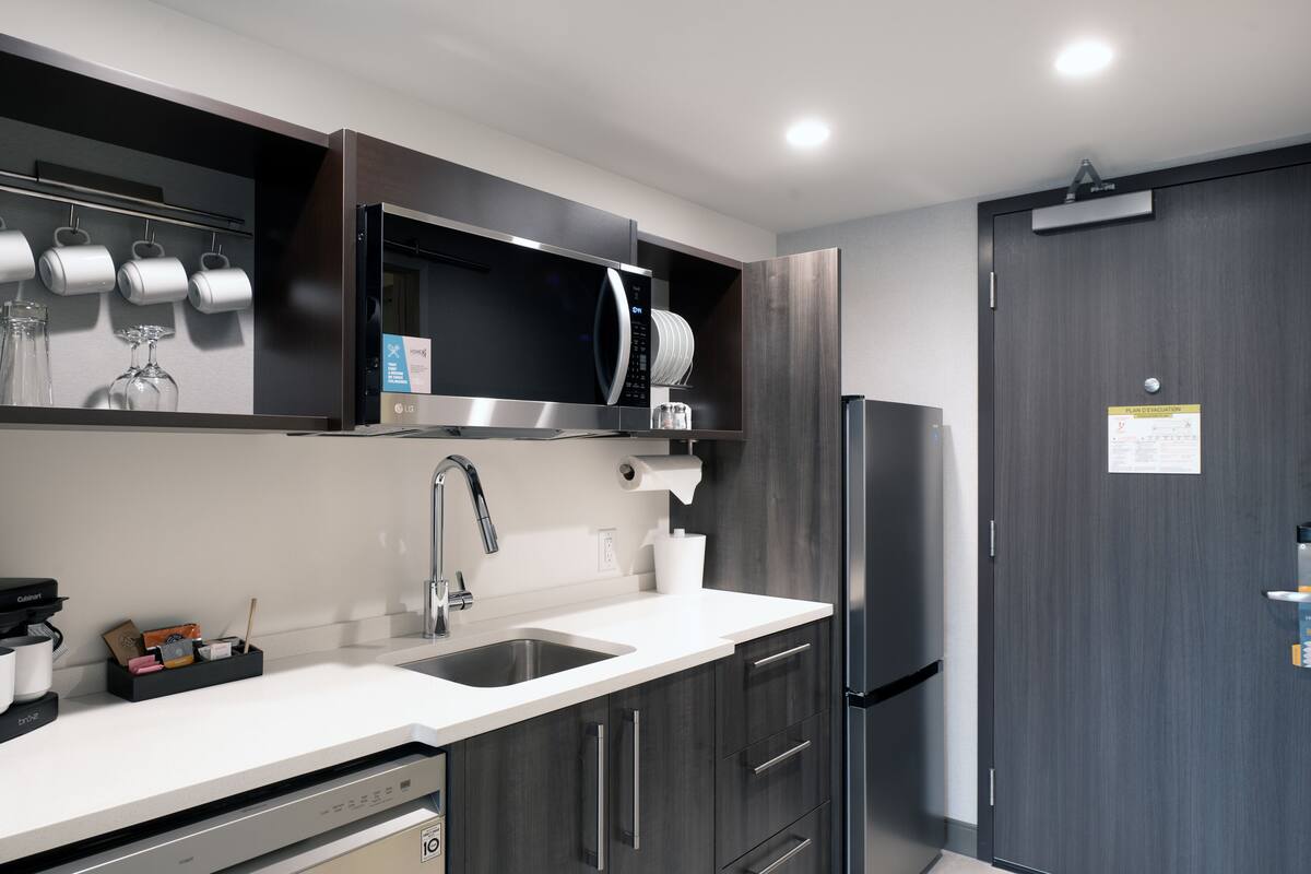 full-sized fridge, microwave, dishwasher, coffee/tea maker