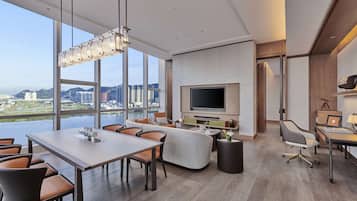 Premium Suite, 1 King Bed | Minibar, in-room safe, laptop workspace, blackout drapes