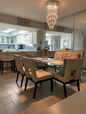 Enjoy cooking in this well-equipped kitchen with a central island, coffee maker, and blender.
