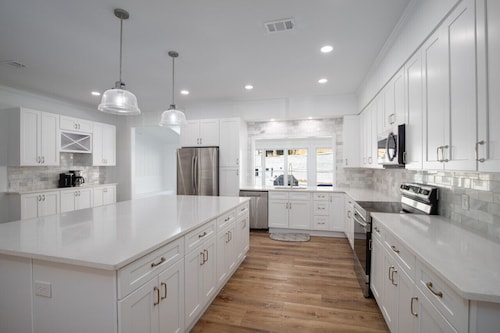 Welcome to Paradise! Totally renovated 4BR/4BA with stunning pool/outdoor space.
