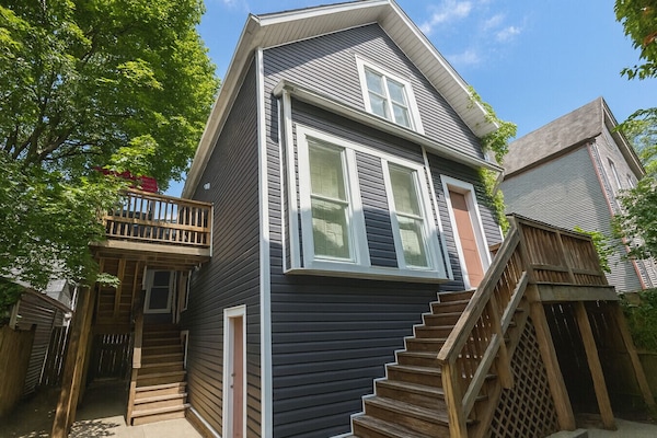 Side stairwell to Entrance of Unit (see red umbrella on deck)